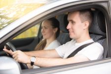 young-man-driving-woman-sitting-near-car_1163-2673.jpg